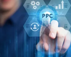man touching PPC marketing services button on touch screen